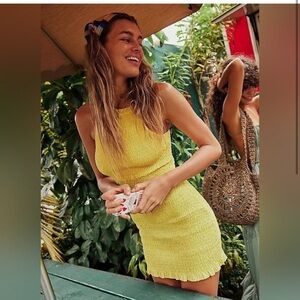 iyla smocked mini dress in yellow